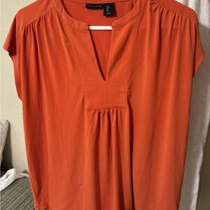 burnt orange shirt